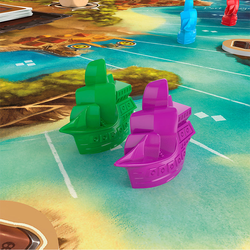 Load image into Gallery viewer, Close up view of the ship player pieces on the game board. Ship pieces are shown to be green, magenta, blue, and red.