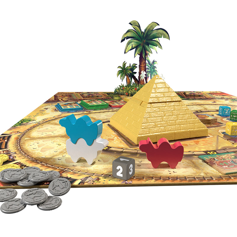 Load image into Gallery viewer, Camel Up Board Game - view of sample components including game board with pyramid and palm tree figures, camel meeples, game dice, and game tokens.