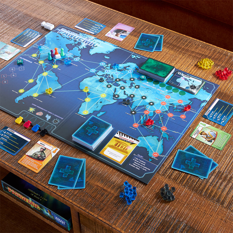 Load image into Gallery viewer, Pandemic Board Game contents displayed including world map game board, pandemic cards, character cards, disease tokens, and game meeples.