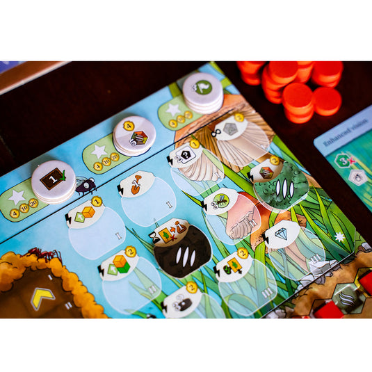 Ants Board Game - Game board and red circular game tokens displayed. 