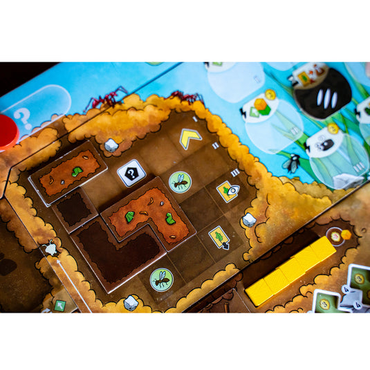 Ants Board Game - Game board with ant colony map and tiles shown. 