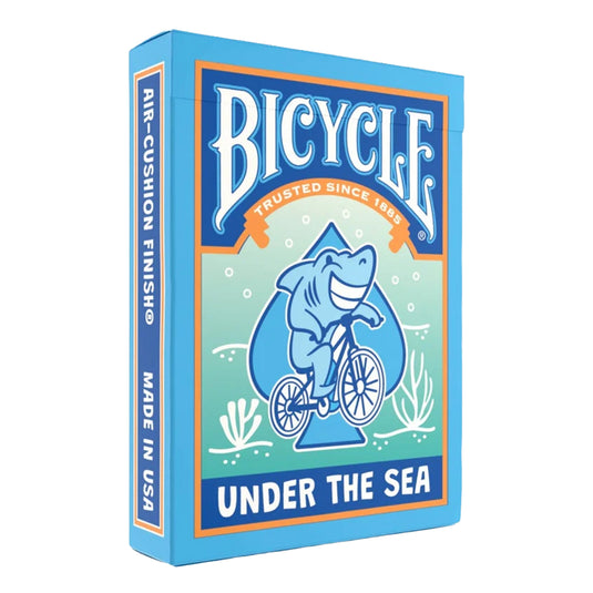 Bicycle Under the Sea Playing Cards - front of packaging featuring art of a shark riding a bicycle. 