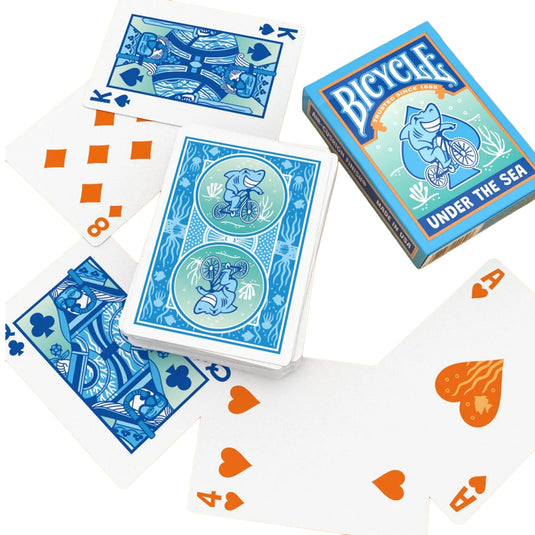 Bicycle Under the Sea Playing Cards - box and sample cards shown with king and queen cards illustrated wearing scuba masks. 