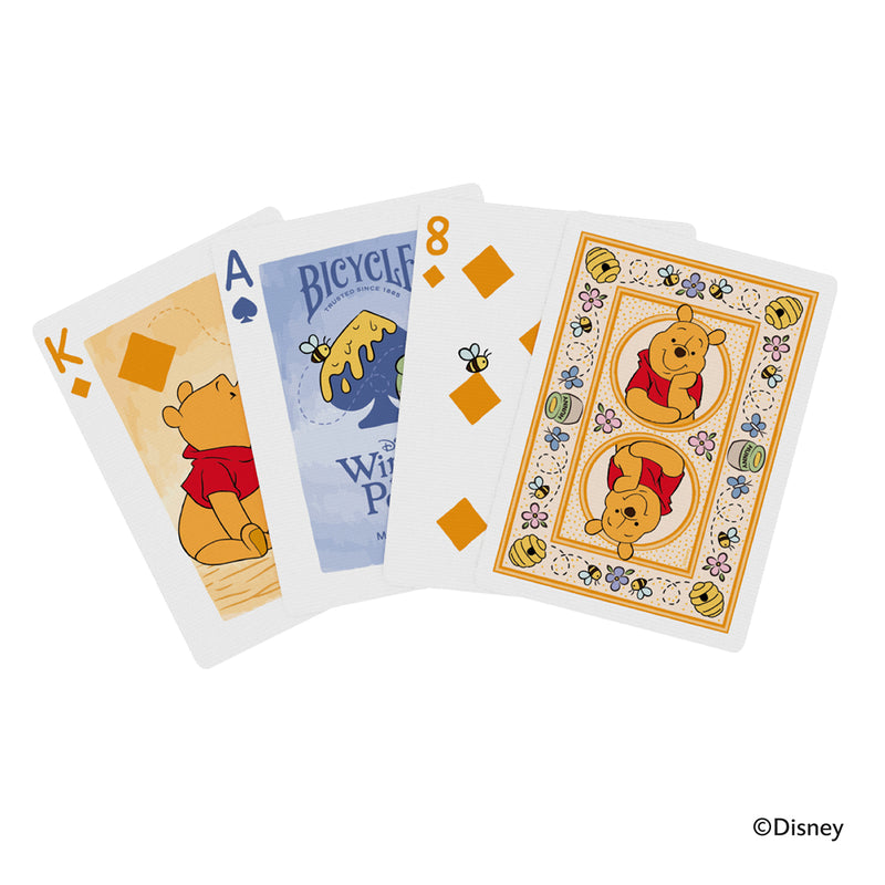 Load image into Gallery viewer, Bicycle Disney Winnie the Pooh Playing Cards - sample cards shown including king of diamonds, ace of spades, and eight of diamonds. 
