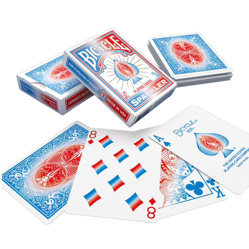 Load image into Gallery viewer, Bicycle Sparkler Playing Cards - box and playing cards shown, with cards featuring red white and blue designs. 
