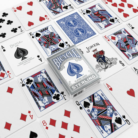 Bicycle Sterling Playing Cards Red/Blue Mix - Packaging and cards displayed with blue card backs. 