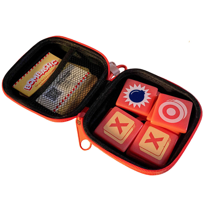 Load image into Gallery viewer, Bombastic Board Game - view of open clamshell case with game tiles and rulebook inside.
