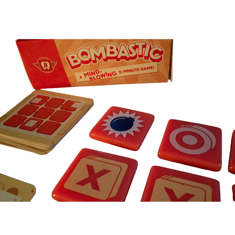 Load image into Gallery viewer, Bombastic Board Game - view of setup game including x tiles, o tiles, and bomb tile, along with game cards.
