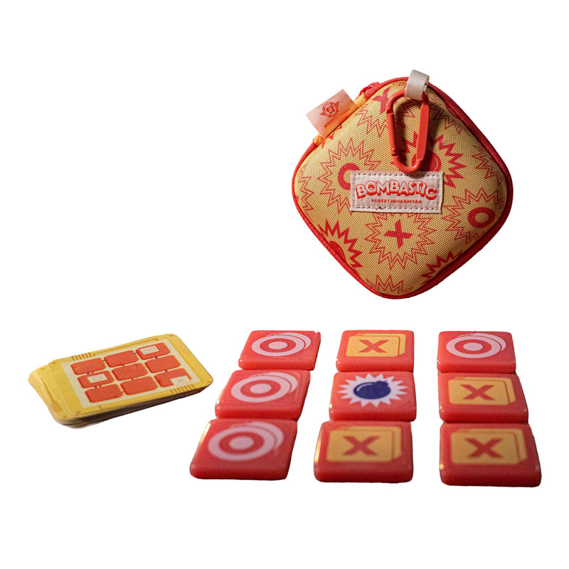Load image into Gallery viewer, Bombastic Board Game - clamshell case with game components displayed in front including game tiles and cards.
