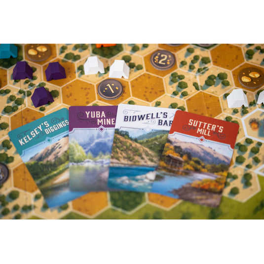 Gold Country Board Game - Sample components shown including location cards, meeples, and game board. 