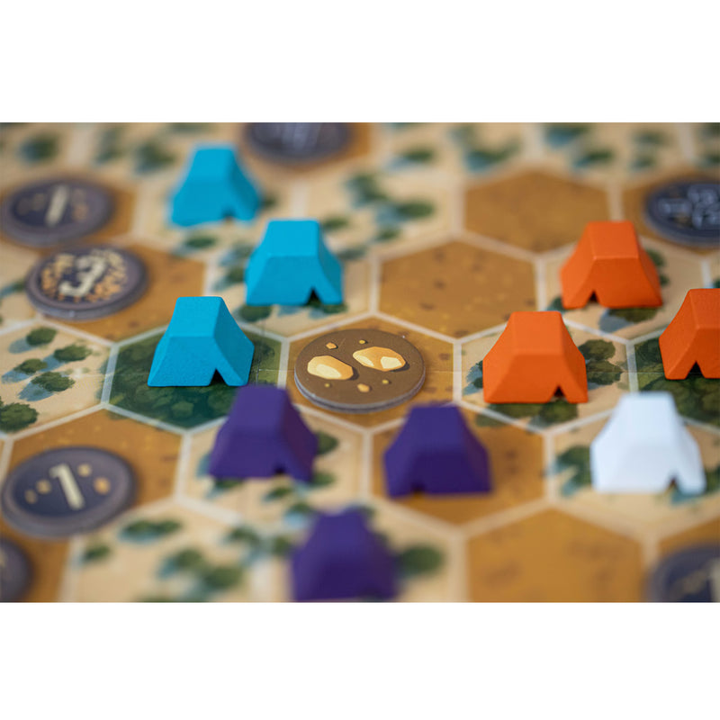 Load image into Gallery viewer, Gold Country Board Game - View of blue, purple, white, and orange meeples on game board. 
