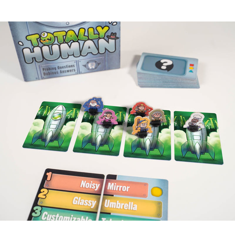Load image into Gallery viewer, Totally Human Party Game - Rocket ship cards and character standees displayed. 
