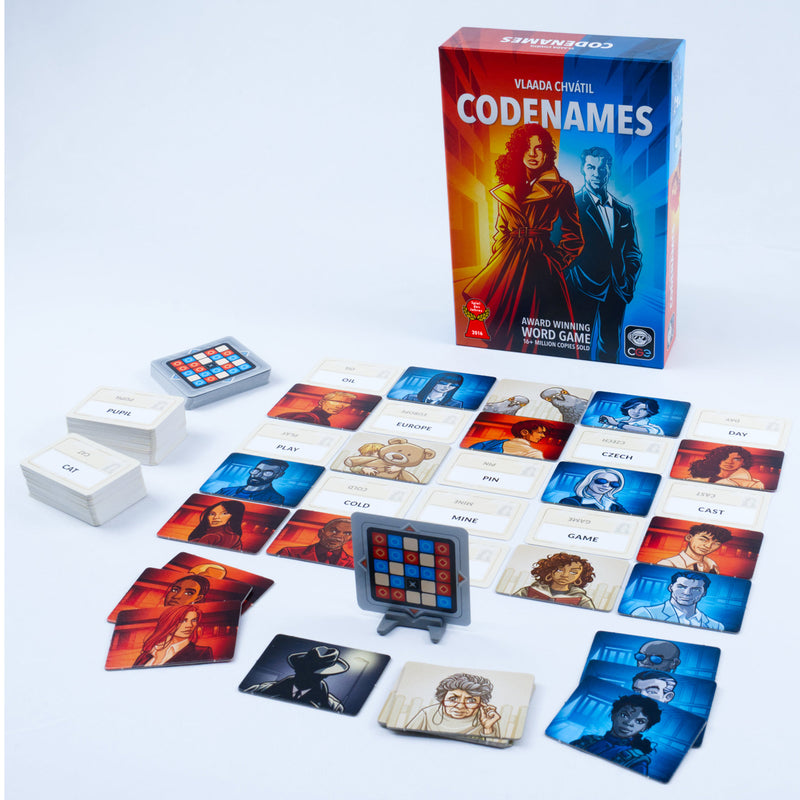 Load image into Gallery viewer, Codenames Party Game - box and setup game shown including word cards, agents map, and agent tiles.
