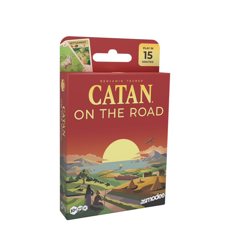 Load image into Gallery viewer, Catan on the Road game box with sunset design and 'asmodee' branding
