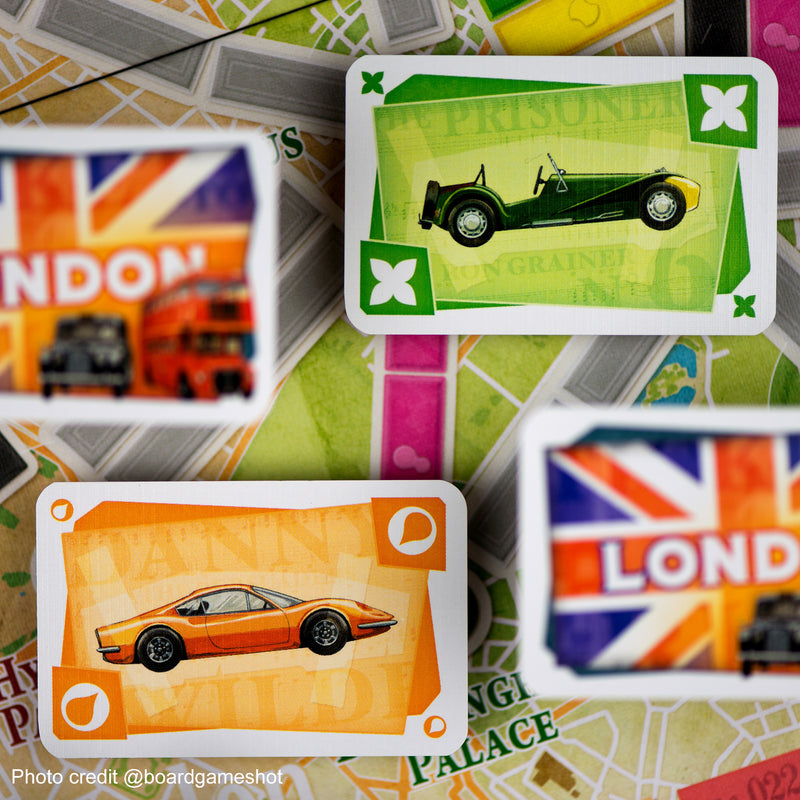 Load image into Gallery viewer, Ticket to Ride: London Board Game - sample game cards including green and orange transit cards.
