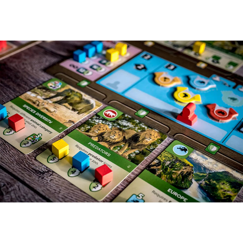 Load image into Gallery viewer, Ark Nova Board Game - sample components shown including game cards with different colored cube tokens on them, and different requirements to play.
