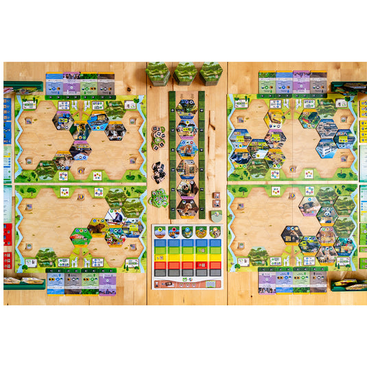 Sanctuary Board Game - view of setup game including hex shaped tiles, game board, and cards.