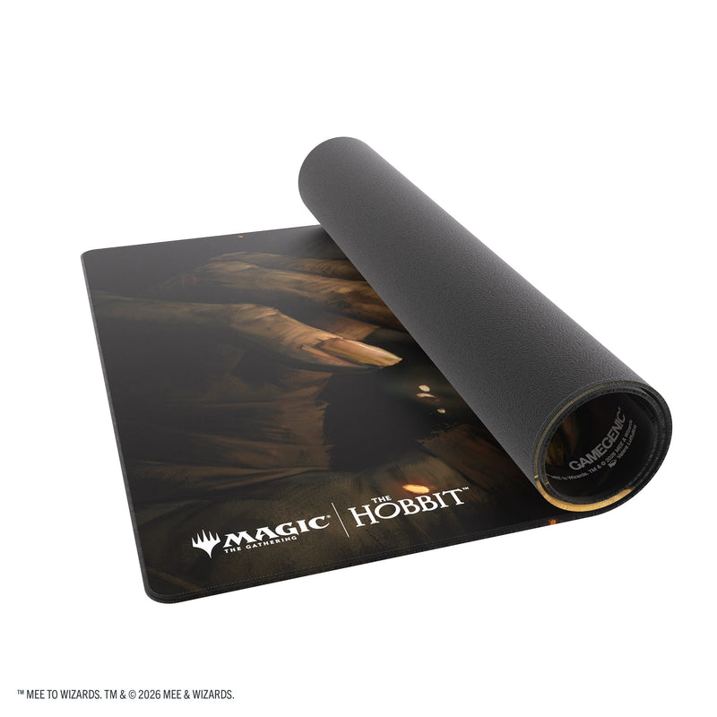 Load image into Gallery viewer, Magic: The Gathering | The Hobbit Shiny Playmat - My Precious - View of partially rolled up playmat.
