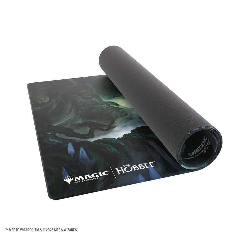 Load image into Gallery viewer, Magic: The Gathering | The Hobbit Shiny Playmat - Mirkwood - View of partially rolled up playmat. 
