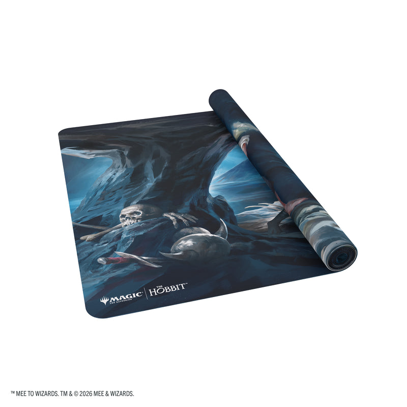 Load image into Gallery viewer, Magic: The Gathering | The Hobbit Prime Table-sized Playmat 6ft - Riddles in the Dark - View of partially rolled up playmat with Magic the Gathering and The Hobbit branding in the corner. 
