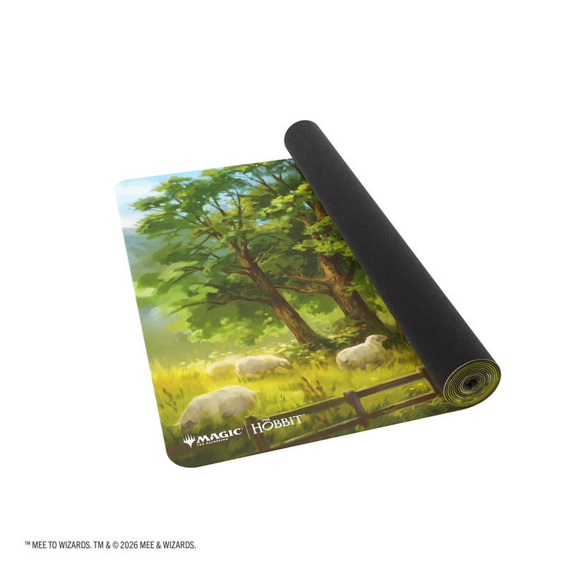 Load image into Gallery viewer, Magic: The Gathering | The Hobbit Prime Table-sized Playmat 8ft - The Fateful Encounter - View of partially rolled up playmat with Magic the Gathering and The Hobbit branding in the corner. 
