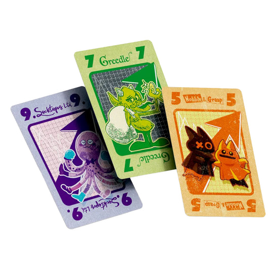 Stonk Market Card Game - Three sample cards shown including a green 7, a purple 9, and an orange 5 card. 