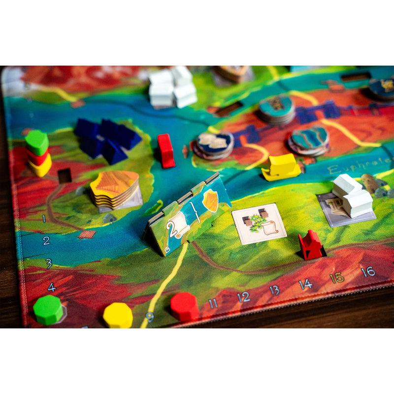 Load image into Gallery viewer, Papyria Board Game - Sample components shown including game board with score track, meeples and resource tokens. 
