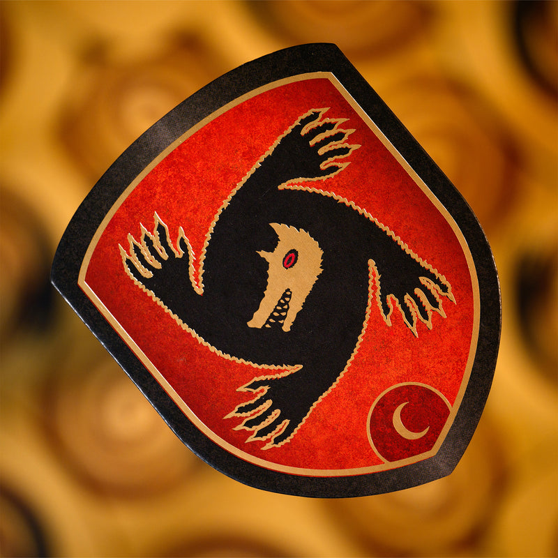 Load image into Gallery viewer, Werewolves of Miller Hollow Limited Edition 25 Years - Werewolf token shown with shield shaped design. 
