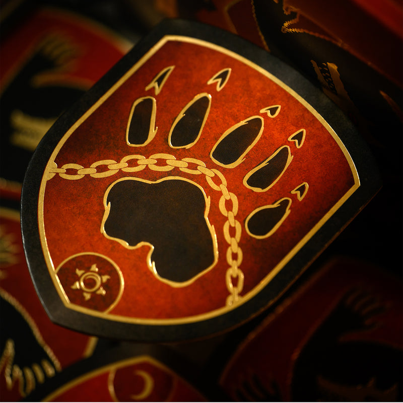 Load image into Gallery viewer, Werewolves of Miller Hollow Limited Edition 25 Years - Red token displayed with wolf print on the back of the token. 
