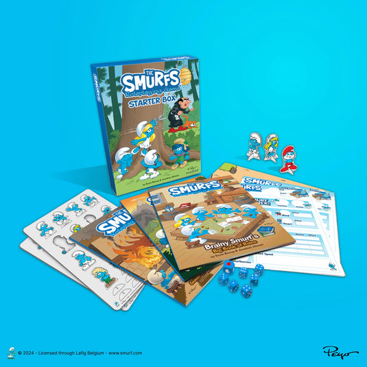The Smurfs Roleplaying Game: Starter Box - Box and game components displayed including smurf standees, blue d6 dice, rulebook, and character sheets. 