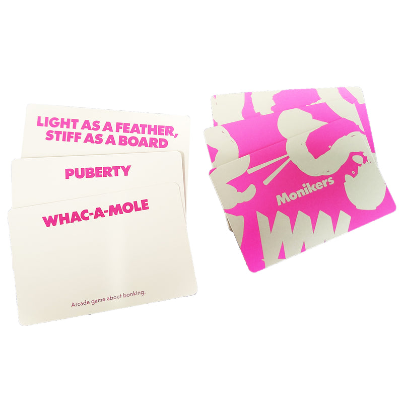 Load image into Gallery viewer, Monikers Party Game - sample cards shown including 'Puberty', 'Light as a Feather, Stiff as a Board', and 'Whac-a-mole' cards.
