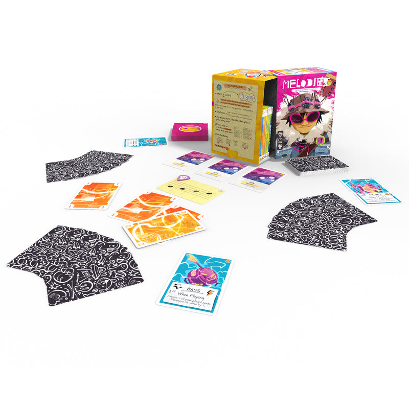 Load image into Gallery viewer, Melodies Card Game - Box and setup game shown including three hands of card, music notes card, and note marker token.
