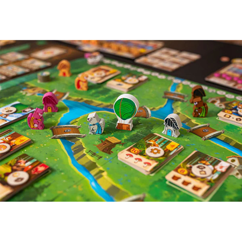 Load image into Gallery viewer, Kingdom Crossing Board Game - View of game board with animal meeples on top. 
