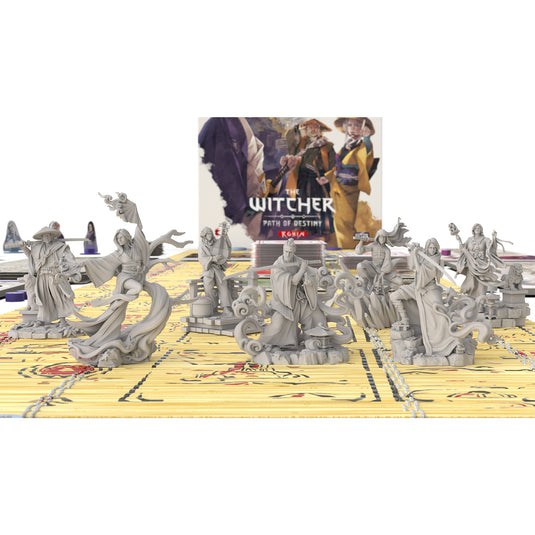The Witcher: Path of Destiny - Ronin Board Game - close up view of character miniatures on the bamboo imitation mat with the game box in the background.