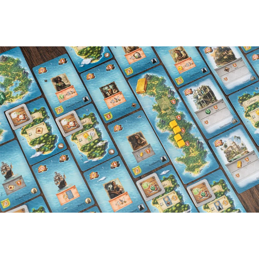 Pirates of Maracaibo Board Game - sample cards displayed on top of coffee table. 