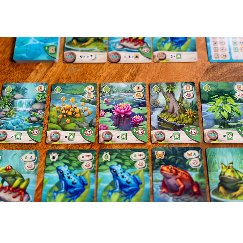 Load image into Gallery viewer, Pondscape Card Game - sample landscape and frog cards shown with different bug icons and and effects listed.
