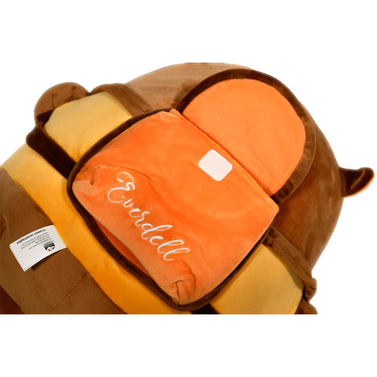 Cozy Critters Everdell Plush Coconut Capybara - Closeup view of plush wearing mini orange Everdell packpack. 